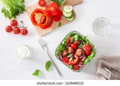 Keto Paleo Lunch Box With Meatballs, Lettuce, Tomato, Cucumber, Bell Pepper