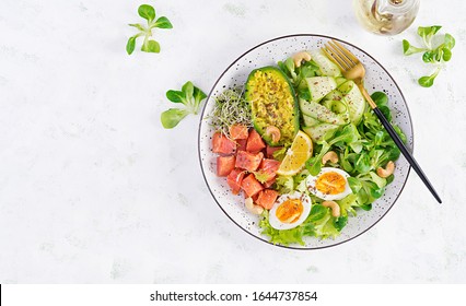 Ketogenic Diet Breakfast. Salt Salmon Salad With Greens, Cucumbers, Eggs And Avocado. Keto/paleo Lunch. Top View, Overhead