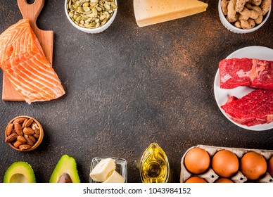 Ketogenic low carbs diet concept. Healthy balanced food with high content of healthy fats. Diet for the heart and blood vessels. Organic ingredients, dark rusty background, copy space top view 