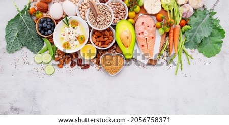 Ketogenic low carbs diet concept. Ingredients for healthy foods selection set up on white concrete background.