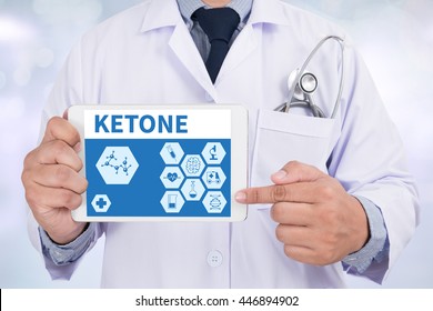 Ketone Doctor Holding  Digital Tablet