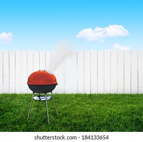 kettle barbecue grill on backyard