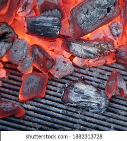 Kettle Grill Pit With Flaming Charcoal. Top View Of BBQ Hot Kettle Grill With Stainless Steel Grid, Isolated Background, Overhead View. Barbecue Kettle Grill On Backyard Ready Grilling Cookout Food.