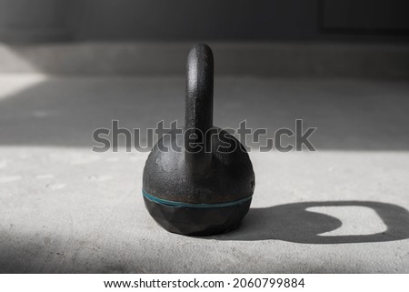 Kettlebell on the floor. kettlebell weight, gym equipment.