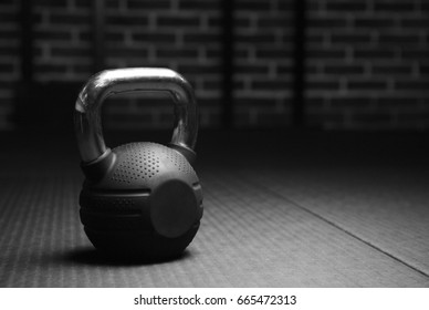 Kettlebell Weights In A Workout Gym In Black And White