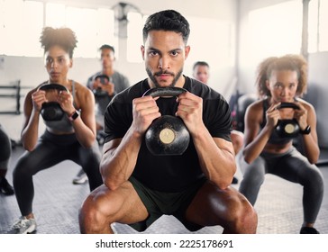 Kettlebell, workout and fitness class with a gym coach and people training with cardio and exercise. Portrait of a strong personal trainer and sports friends in a wellness health club with motivation