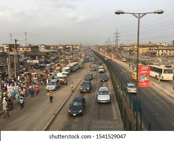 Ketu. Lagos, Nigeria - April 2016. Standing On Bridge Overlooking Market.  