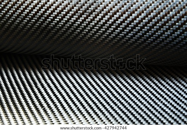 Kevlar carbon fiber texture background/Kevlar\
carbon fiber