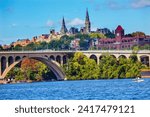 Key Bridge Potomac River Georgetown University Washington DC from Roosevelt Island.  Completed in 1923 this is the oldest bridge in Washington DC.