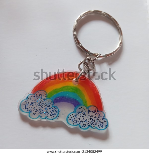 Key chain draw rainbow, handmade with plastic\
shrink and gliter