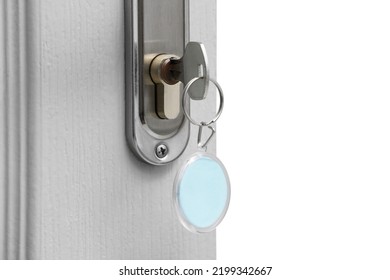 Key With Fob In Door Lock, Closeup. Space For Text