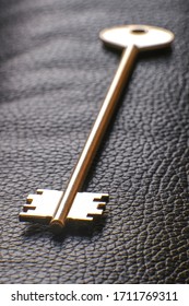 The Key To The Front Door Of The House Is In The Hallway On A Leather Banquette