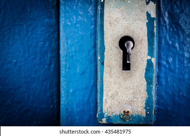 key hole with blue steel door vintage background
