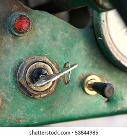 Key In The Ignition Of An Old Tractor