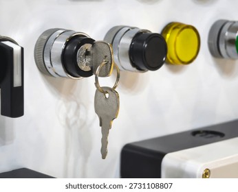 A key is inserted into a lock in a close-up view. The lock features circular components and various colors. The setting emphasizes security and access.