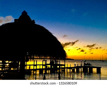 Key Largo sunset with Tiki Hut in foreground - Powered by Shutterstock