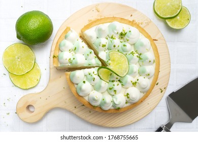 Key Lime Cheese Tart With Whipping Cream On The Table, Horizontal View From Above