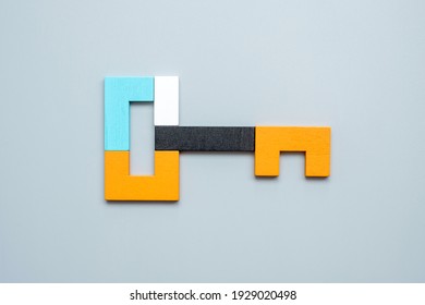 Key Shape Of Geometric Colorful Wood Puzzle Pieces. Logical Thinking, Business Logic, Conundrum, Decision, Solutions, Rational, Mission, Success, Goals And Strategy Concepts