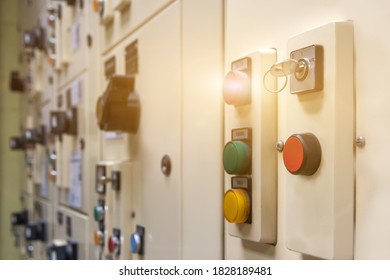Key switch select mode in electrical control panel contains switch buttons for operating industrial machine and factory equipment in industry