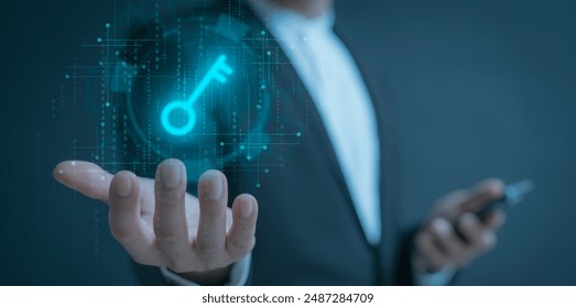 Key unlock Business man holding and managed his cybersecurity and privacy to protect data by key icon holographic technology. protecting personal data on virtual interfaces, keys to successful