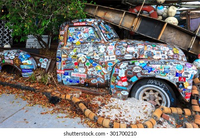 KEY WEST, FLORIDA, USA - 08 October, 2014: Old Car Covered With A Variety Of Stickers At Bo's Fish Wagon Restaurant In Key West, Florida, USA On 08 October, 2014.