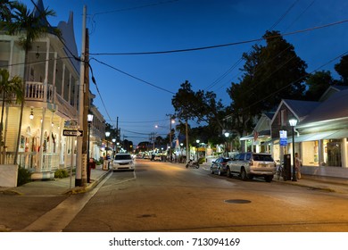 KEY WEST, FLORIDA, USA - JAN 18, 2017: Shops, Bars And Hotels In The Twilight At Duval Street In The Center Of Key West