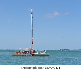 KEY WEST, FLORIDA, USA-APRIL 18, 2019:  A Sebago Catamaran Takes People On A Snorkel Diving Trip To The Coral Reef Off Of Key West.