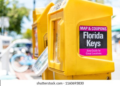 Key West, USA - May 1, 2018: Florida Keys Newspaper, Vending Machine, Kiosk, Booth, Box, Dispenser With Map, Area Guide, Free Coupons Outside, Outdoors, On Street, By Road