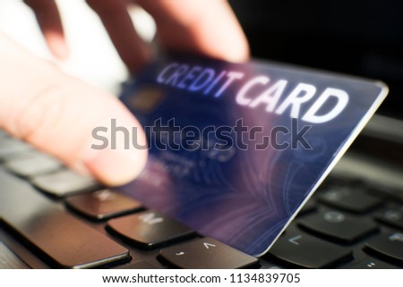 Keyboard with button pay and credit card - payment concept I am author of image used on credit card and used data are fictitious.