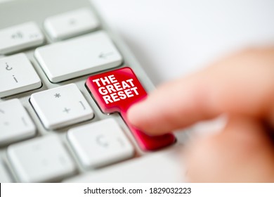 Keyboard Button Pressed By A Finger Representing The Great Reset Concept