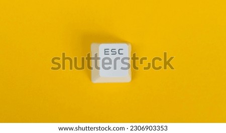 Keyboard Esc button on yellow background