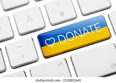 Keyboard key with Ukraine flag and donate text. donation for Ukraine concept