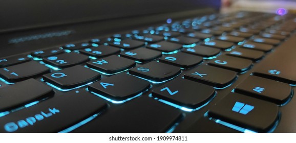 Keyboard Laptop with Blue Backlight - Shutterstock ID 1909974811