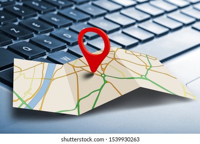 Keyboard from laptop with Map marker pointer