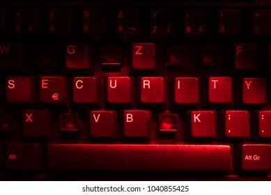 Keyboard with missing letters, the word security in center, virus, hackerattack, red warning, security hole