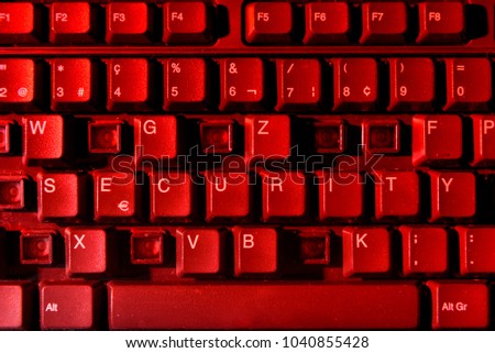 Keyboard with missing letters, the word security in center, virus, hackerattack, red warning, security hole