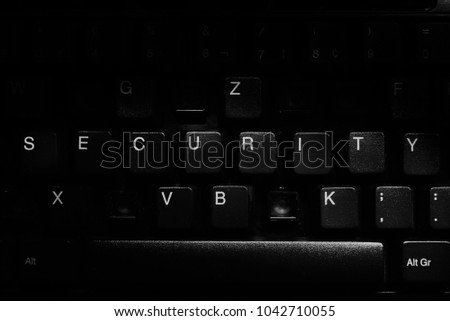 Keyboard with missing letters, the word security in center, synonym for  virus, hackerattack, security hole, cloud security, black and white
