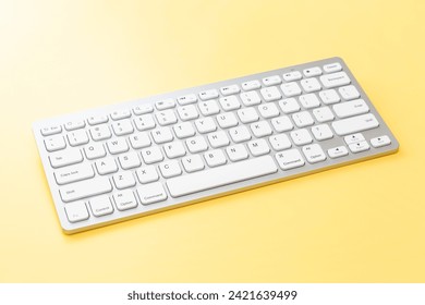 Keyboard on a yellow background.