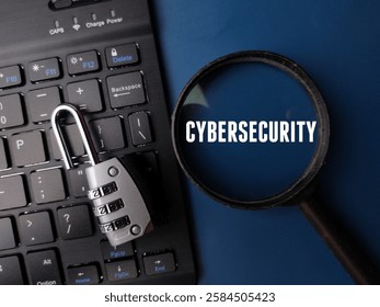 Keyboard and padlock with the word CYBERSECURITY on a blue background.