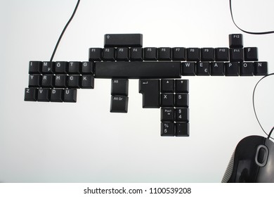 Keyboard Shaped As A Weapon Symbolizes Cyber Crime And Illegal Weapon Trade In The Dark Net And Internet 