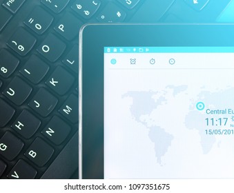 A keyboard with a tablet.