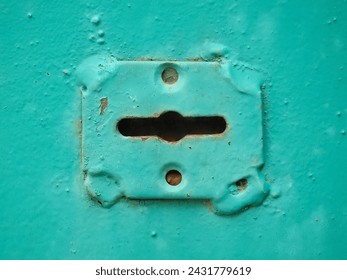 Keyhole in an old rusty green door. Dramatic image of a castle. - Powered by Shutterstock