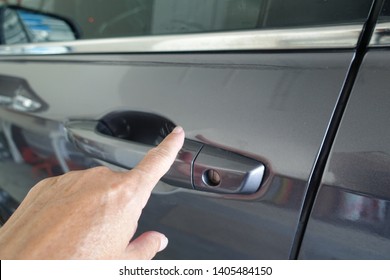 Keyless entry car key.  A keyless entry system is an electronic lock that controls access to a building or vehicle without using a traditional mechanical key.