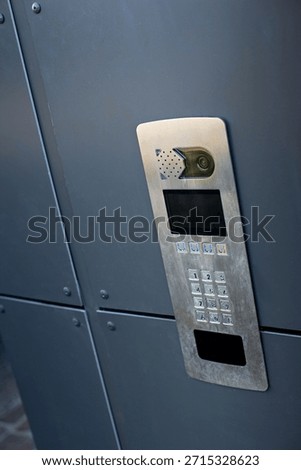 Keypad and camera on a section of wall
