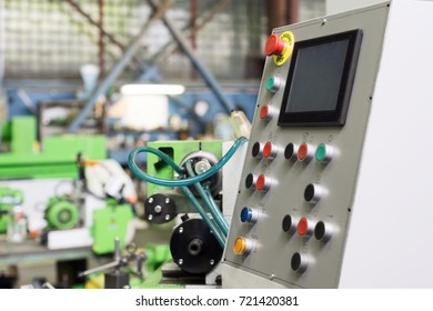 Keypad control panel and LCD screen of metalworking machine.