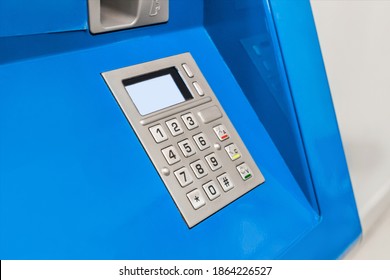 Keypad with a screen for dialing numbers and symbols pin-code terminal for issuing money, close-up
