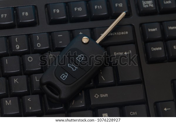 keys to the car on the keyboard, remote control,\
buy and sell over the\
Internet