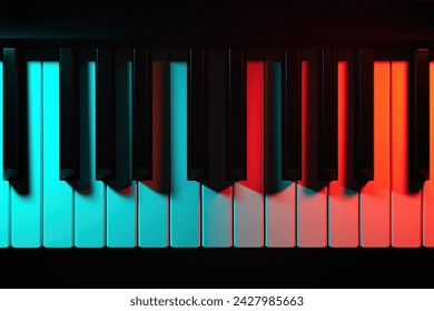 Keys of a keyboard instrument (piano, grand piano, synthesizer) shot with color lighting - blue and red light. Atmospheric music, concert, advertising of music training courses.  - Powered by Shutterstock