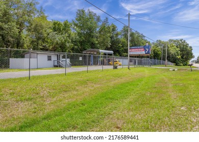 Keystone Heights, Florida USA - July 9, 2022: Exterior Of A Former Auto Mechanic Building Now Abandoned