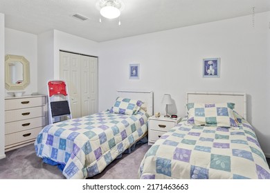 Keystone Heights, Florida USA - June 25, 2022: Spare Bedroom With Two Twin Beds